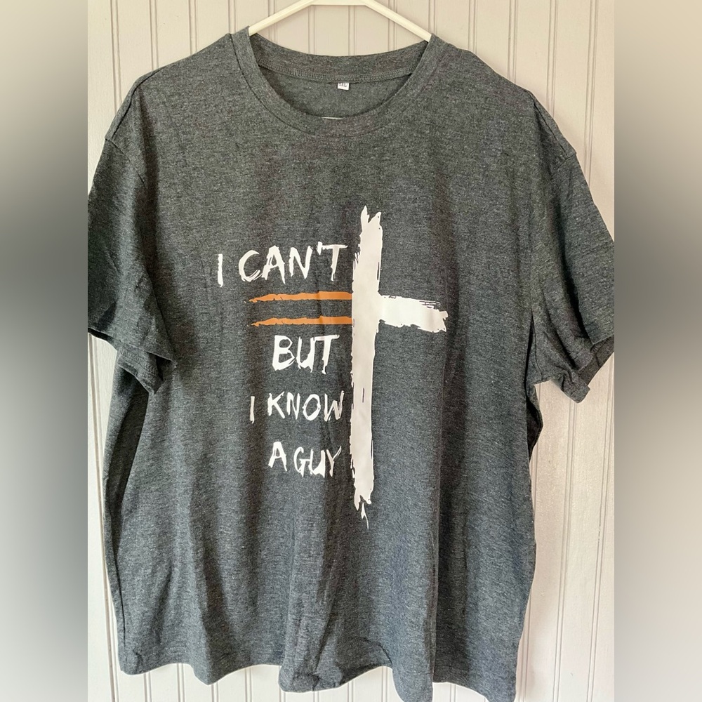 Faith Christian Gray T-shirt. “I Can’t But I Know A Guy”. Pit to pit 24 inches.